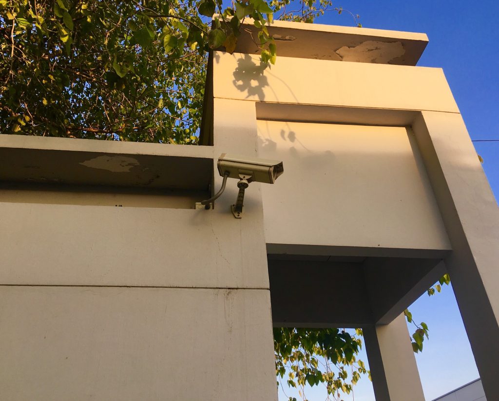 Security camera on wall